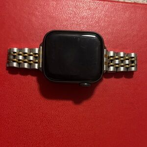 Apple Smartwatch with Black Face and Silver-Gold Band